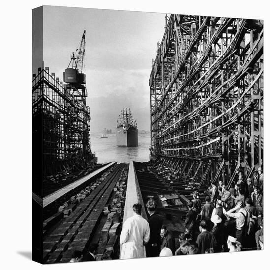 Shipyard Workers Watching as the "Bethlehem Fairchild" Launches Into the Water-Marie Hansen-Stretched Canvas