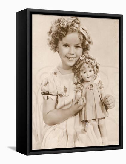Shirley Temple American Child Star of the 1930s Seen Here with a Shirley Temple Doll-null-Framed Stretched Canvas