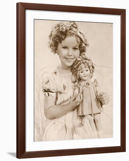 Shirley Temple American Child Star of the 1930s Seen Here with a Shirley Temple Doll-null-Framed Photographic Print