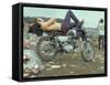 Shirtless Man in Levi Strauss Jeans Lying on Motorcycle Seat at Woodstock Music Festival-Bill Eppridge-Framed Stretched Canvas