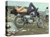 Shirtless Man in Levi Strauss Jeans Lying on Motorcycle Seat at Woodstock Music Festival-Bill Eppridge-Stretched Canvas