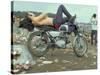 Shirtless Man in Levi Strauss Jeans Lying on Motorcycle Seat at Woodstock Music Festival-Bill Eppridge-Stretched Canvas