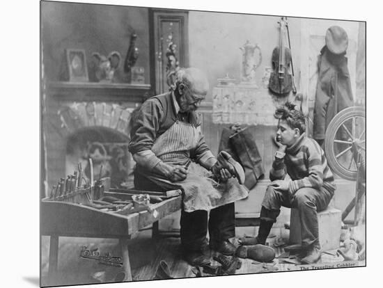 Shoemaker Preparing Shoes for Young Boy-null-Mounted Photographic Print