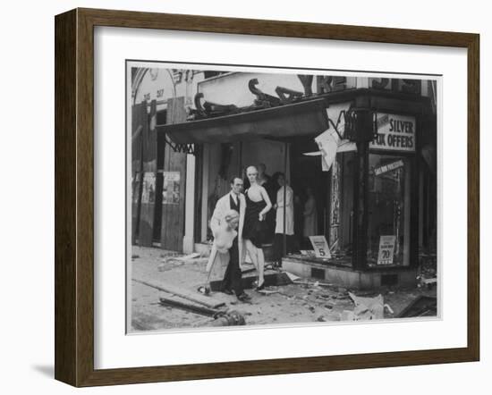 Shop Owner Poses with Two Mannequins Following the Destruction of His Shop by German Bombers-null-Framed Photographic Print