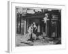 Shop Owner Poses with Two Mannequins Following the Destruction of His Shop by German Bombers-null-Framed Photographic Print