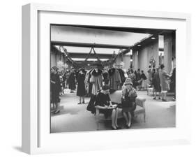 Shoppers in the Women's Coat Dept. of Saks Fifth Ave. Department Store-Alfred Eisenstaedt-Framed Photographic Print