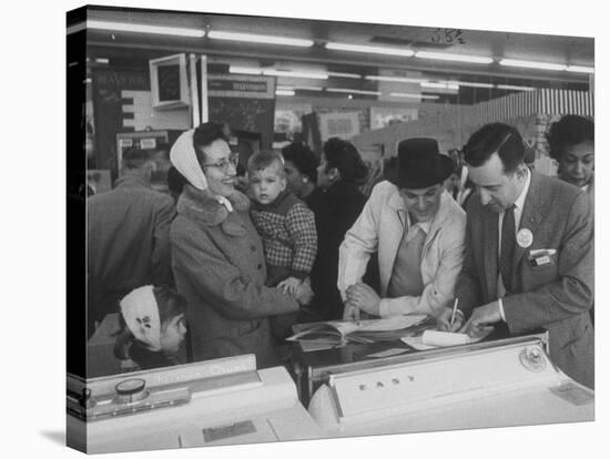 Shoppers Looking at Appliances in Polk's Department Store-Francis Miller-Stretched Canvas