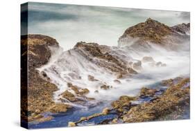 Shore Acres State Park, Oregon, USA. Blur of waves flowing over rocks.-Emily Wilson-Stretched Canvas