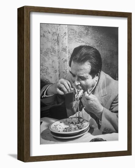 Shoveling Is Good for Speed But Not for the Vest or the Tablecloth at Gene Leone's Restaurant-null-Framed Photographic Print