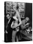 Show Girl Modeling Bikini For Customers at Lunch-Bill Ray-Stretched Canvas