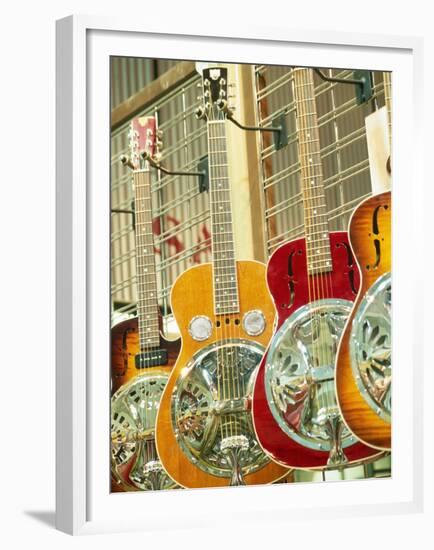 Showcase Displaying Dobro Resonating Guitars-Barry Winiker-Framed Premium Photographic Print