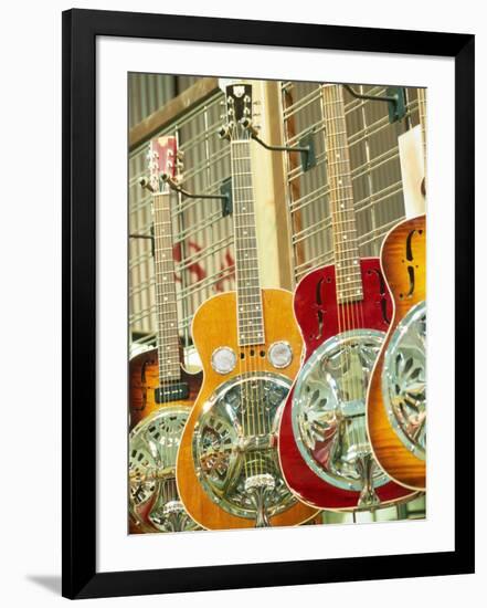 Showcase Displaying Dobro Resonating Guitars-Barry Winiker-Framed Photographic Print