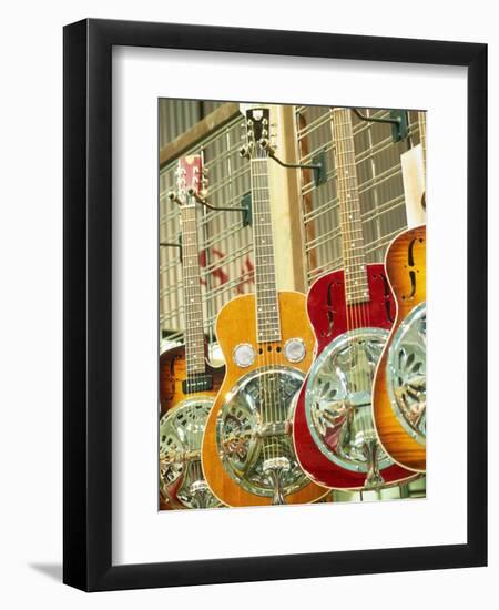 Showcase Displaying Dobro Resonating Guitars-Barry Winiker-Framed Photographic Print