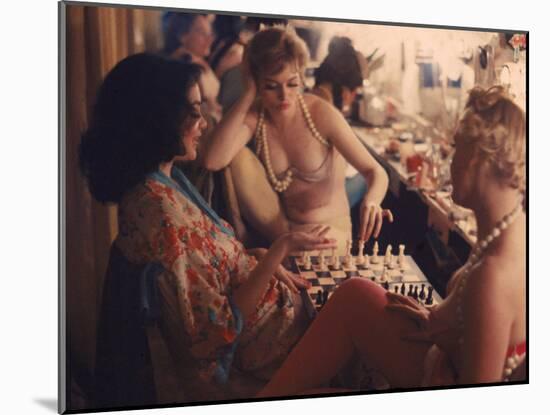 Showgirls Playing Chess Between Shows at Latin Quarter Nightclub-Gordon Parks-Mounted Photographic Print