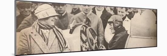 'Showing the driving mechanism to interested spectators', c1927, (1935)-Unknown-Mounted Photographic Print