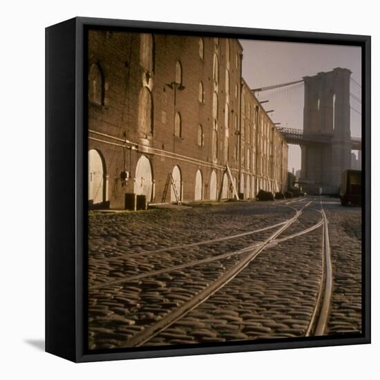 Shuttered Warehouses Lit by Sunlight on Trolley Track Railed Street Along Brooklyn Waterfront-Walker Evans-Framed Stretched Canvas