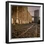 Shuttered Warehouses Lit by Sunlight on Trolley Track Railed Street Along Brooklyn Waterfront-Walker Evans-Framed Photographic Print