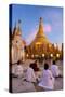 Shwedagon Paya (Pagoda) at Dusk with Buddhist Worshippers Praying-Lee Frost-Stretched Canvas