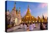 Shwedagon Paya (Pagoda) at Dusk with Buddhist Worshippers Praying-Lee Frost-Stretched Canvas