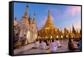 Shwedagon Paya (Pagoda) at Dusk with Buddhist Worshippers Praying-Lee Frost-Framed Stretched Canvas