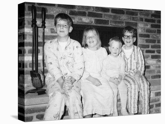 Siblings Perch on a Hearth in Pajamas, Ca. 1970-null-Stretched Canvas