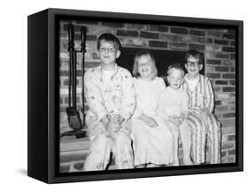 Siblings Perch on a Hearth in Pajamas, Ca. 1970-null-Framed Stretched Canvas