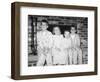 Siblings Perch on a Hearth in Pajamas, Ca. 1970-null-Framed Photographic Print