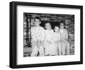 Siblings Perch on a Hearth in Pajamas, Ca. 1970-null-Framed Photographic Print