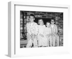 Siblings Perch on a Hearth in Pajamas, Ca. 1970-null-Framed Photographic Print