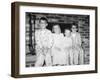 Siblings Perch on a Hearth in Pajamas, Ca. 1970-null-Framed Photographic Print