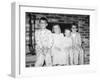 Siblings Perch on a Hearth in Pajamas, Ca. 1970-null-Framed Photographic Print