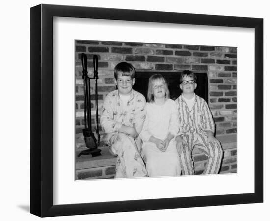 Siblings Pose on the Hearth in Pajamas, Ca. 1970-null-Framed Photographic Print