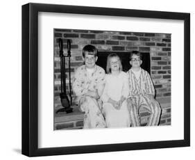 Siblings Pose on the Hearth in Pajamas, Ca. 1970-null-Framed Photographic Print
