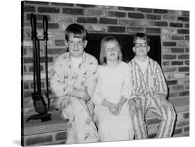 Siblings Pose on the Hearth in Pajamas, Ca. 1970-null-Stretched Canvas