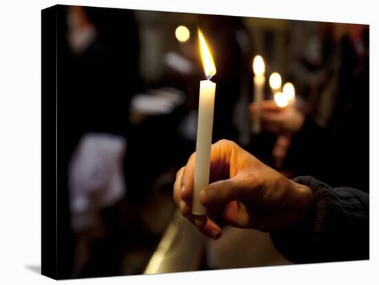 Sicily, Italy, Western Europe, a Believer, Holding a Candle During the Easter Eve Ceremony at the T-Ken Scicluna-Stretched Canvas