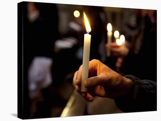 Sicily, Italy, Western Europe, a Believer, Holding a Candle During the Easter Eve Ceremony at the T-Ken Scicluna-Stretched Canvas