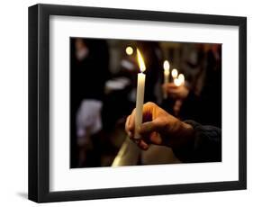 Sicily, Italy, Western Europe, a Believer, Holding a Candle During the Easter Eve Ceremony at the T-Ken Scicluna-Framed Photographic Print