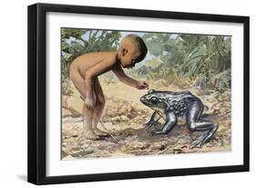 Side Profile of a Boy Looking at a Goliath Frog (Gigantorana Goliath)-null-Framed Giclee Print