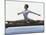 Side Profile of a Female Gymnast Stretching on a Balance Beam-null-Mounted Premium Photographic Print