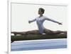Side Profile of a Female Gymnast Stretching on a Balance Beam-null-Framed Photographic Print