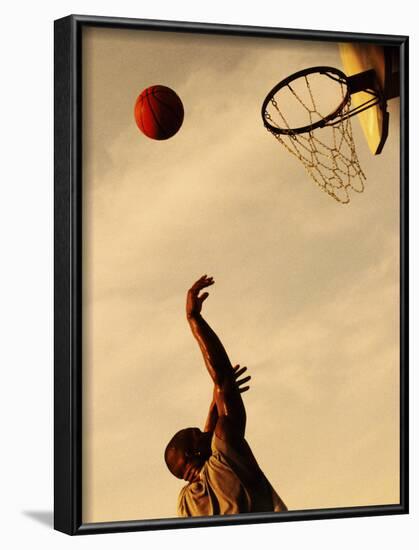 Side Profile of a Mid Adult Man Playing Basketball-null-Framed Photographic Print