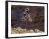 Side Profile of a Person on a Bicycle in Mid Air-null-Framed Photographic Print