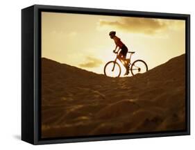 Side Profile of a Young Woman Cycling-null-Framed Stretched Canvas