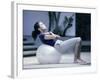 Side Profile of a Young Woman Exercising on a Fitness Ball-null-Framed Photographic Print
