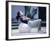 Side Profile of a Young Woman Exercising on a Fitness Ball-null-Framed Photographic Print