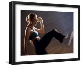 Side Profile of a Young Woman Kickboxing-null-Framed Photographic Print