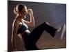 Side Profile of a Young Woman Kickboxing-null-Mounted Photographic Print