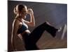 Side Profile of a Young Woman Kickboxing-null-Mounted Photographic Print