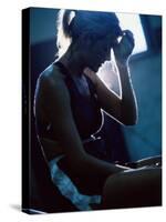 Side Profile of a Young Woman Sitting-null-Stretched Canvas