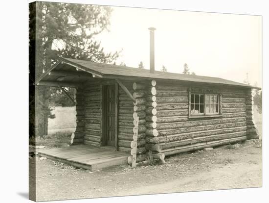 Side View of a Log Cabin Home-null-Stretched Canvas